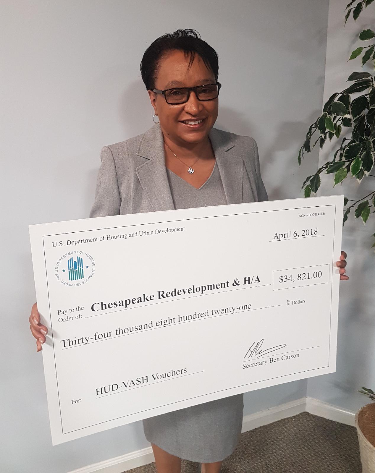 Brenda with VASH voucher award from HUD April 2018A